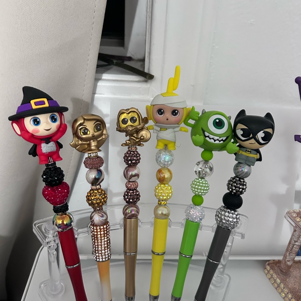 Favorite Characters Action Figure Pen Set - Red, Gold, Green, Black